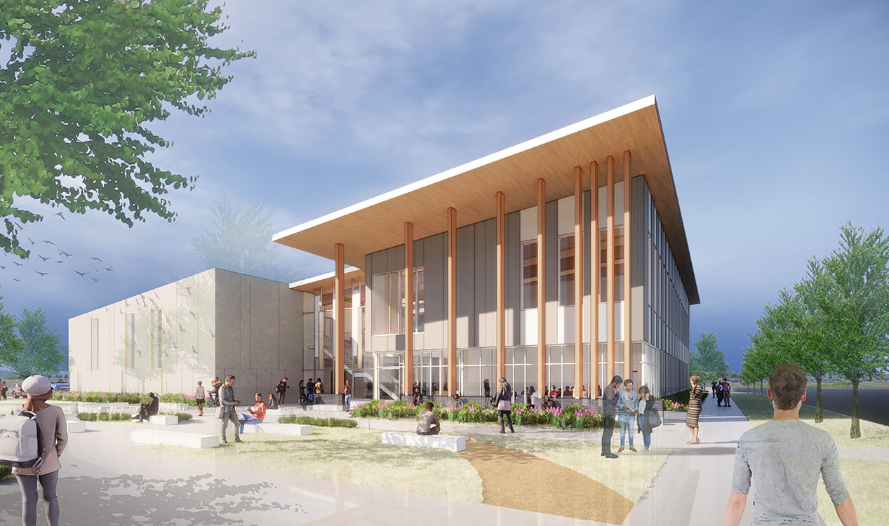 Tillamook Bay Community College Facilities Master Plan. A large campus building with two distinct halves with a busy courtyard in front. The portion of the building in the foreground is three stories tall with large windows and mass timber columns supporting a sizable overhang. The second half of the building is shown in the background and appears to be light grey with long, narrow window openings.