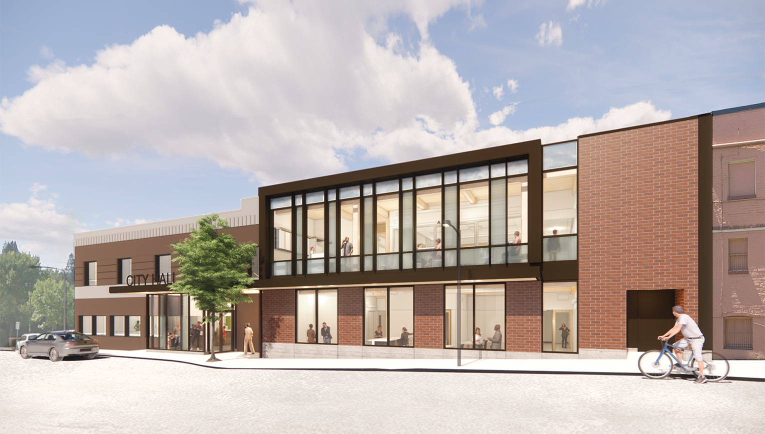 Exterior rendering of renovated and expanded Forest Grove City Hall featuring floor to ceiling windows on the second floor addition. Both the additon, as well as the original building, which can be seen in the background are clad in brick. A bicyclist is riding by on the right.
