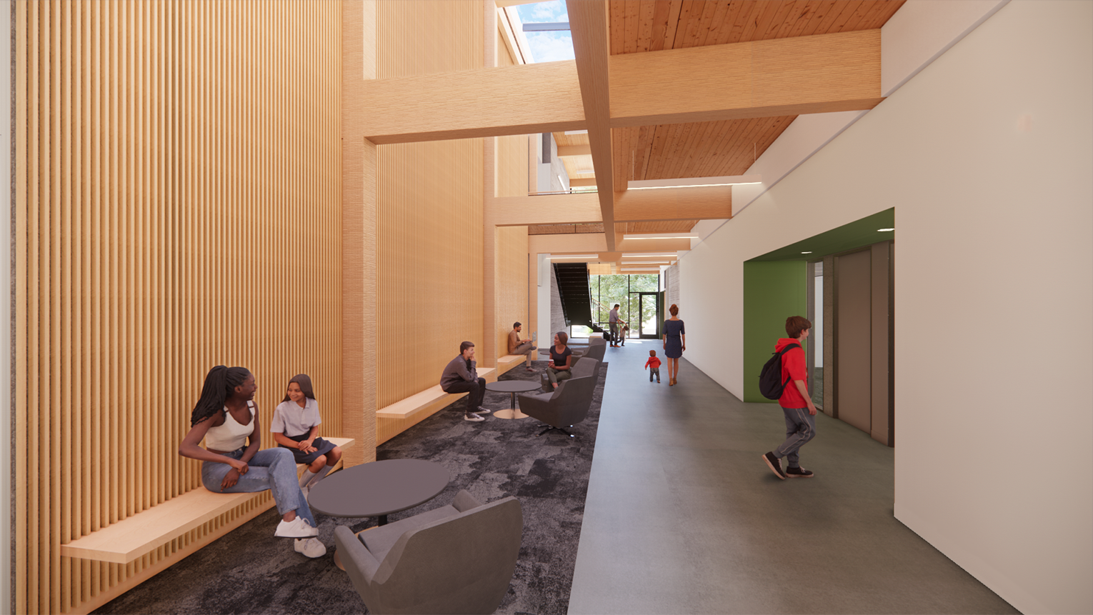 Bright hallway with skylights, mass timber, and people visiting and passing through