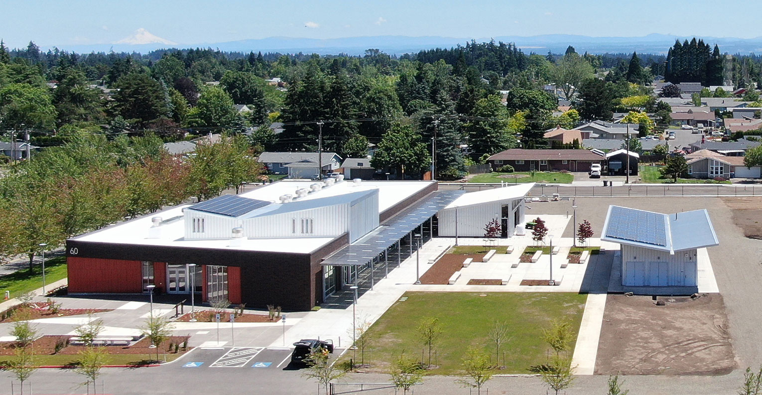 Aerial photo of academic building and surrounding site and outbuildings