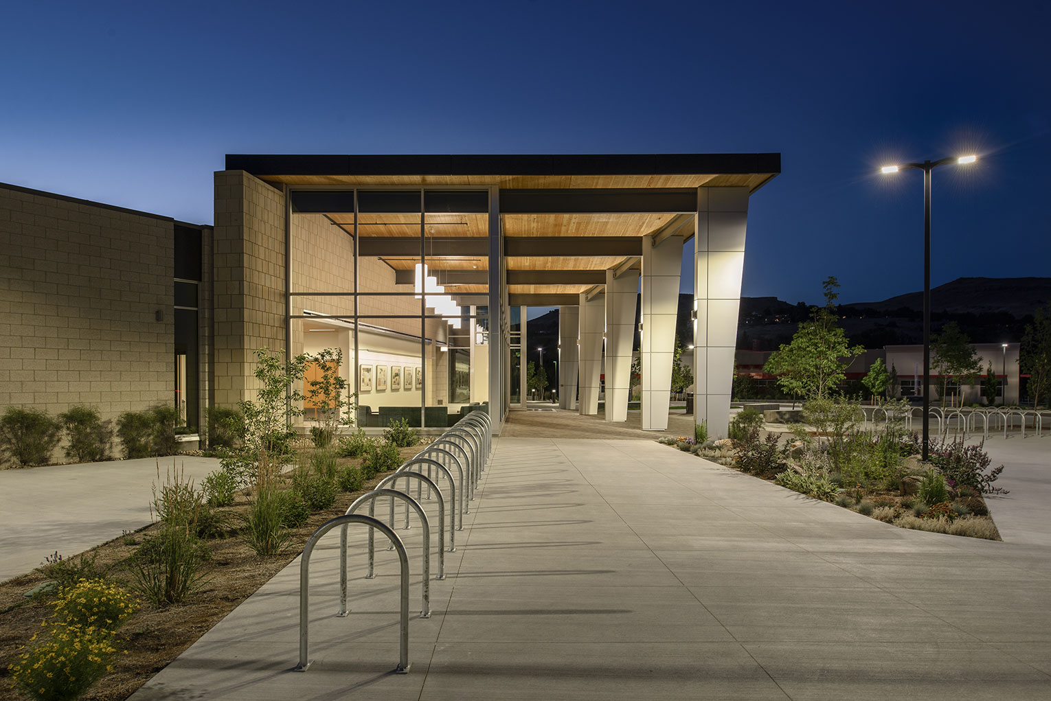 Dusk shot of library arcade with gallery inside.