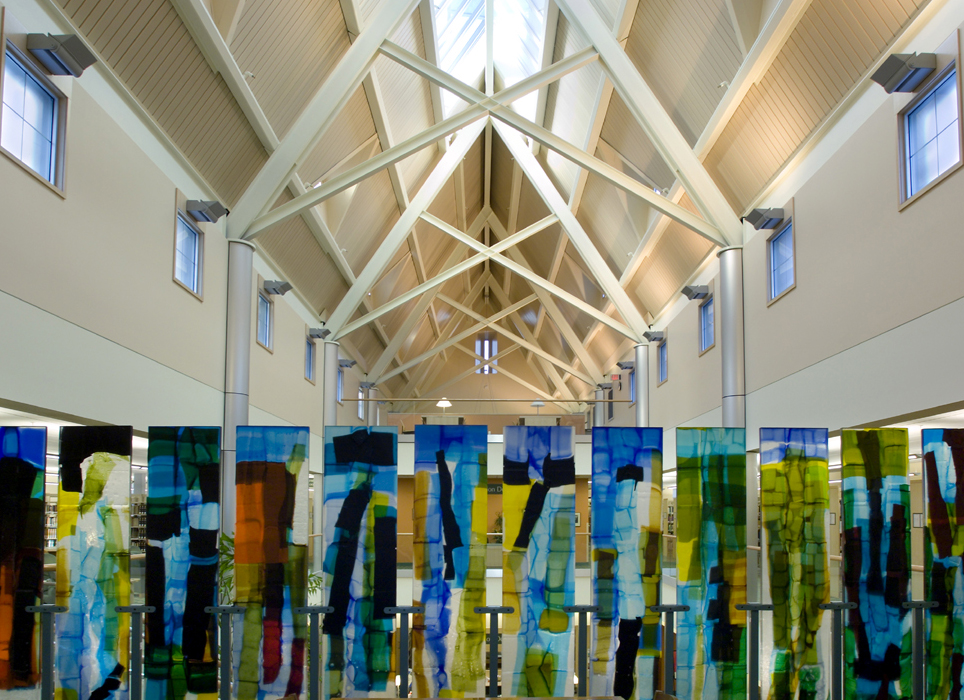 A colorful wall of fused glass art