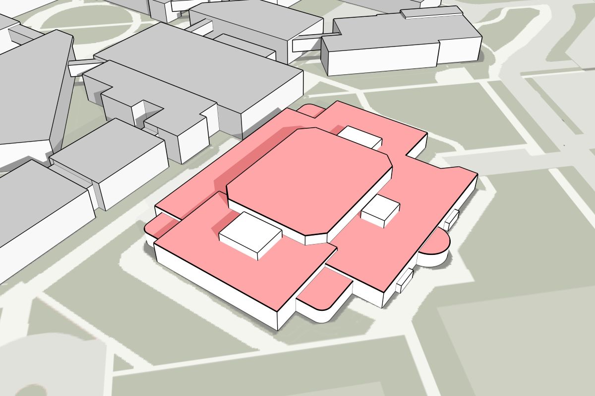 Massing diagram highlights the Chemeketa Athletic Center within its broader campus context, showing the existing building footprint and roof forms.